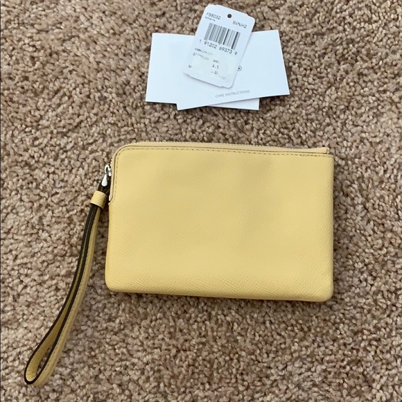 SOLD brand new never used coach wristlet - Picture 2 of 3
